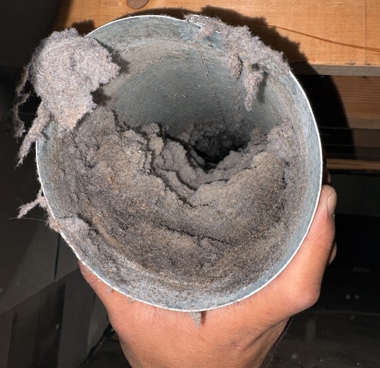 Clogged dryer exhaust duct due to improper installation